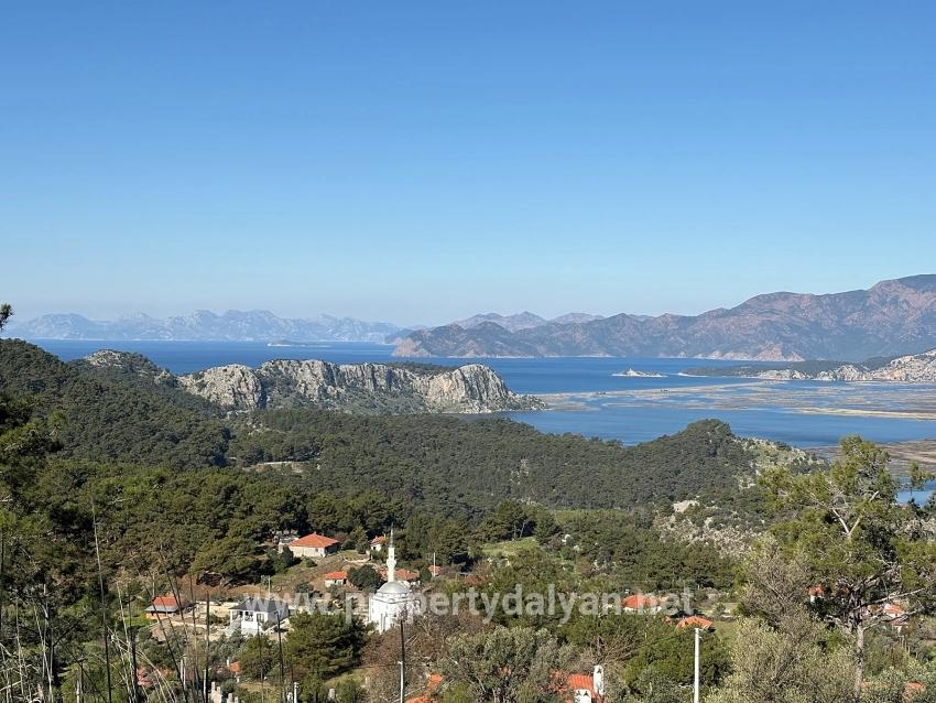 Gökbel'de Köy Yerleşik Alanı İçerisinde Deniz Manzaralı 1000m2 Satılık Arazi