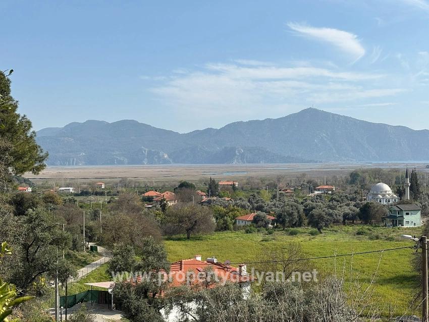 Köyceğiz Çandır Köyü'de Hisseli Rızai Taksimli 2.023m2 Satılık Tarla